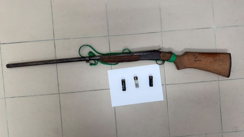 Two men were arrested with a homemade rifle seized in Lawas.