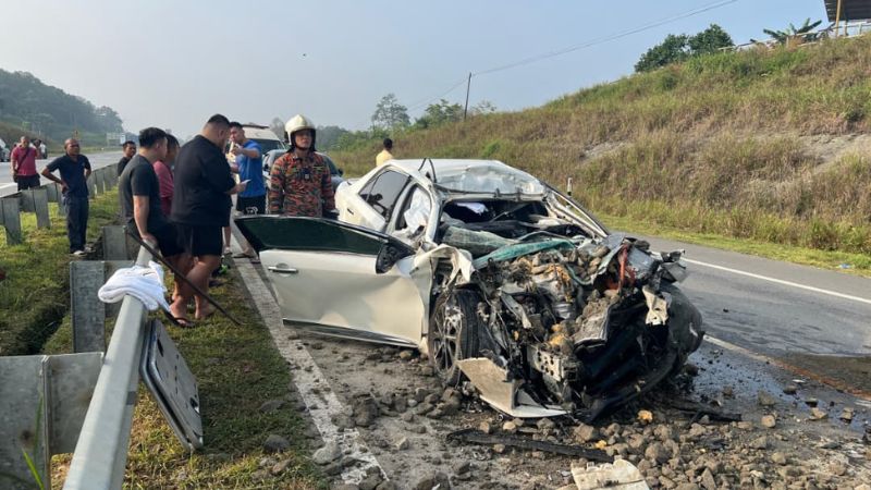Woman killed by a truck wreck on Pan Borneo Road